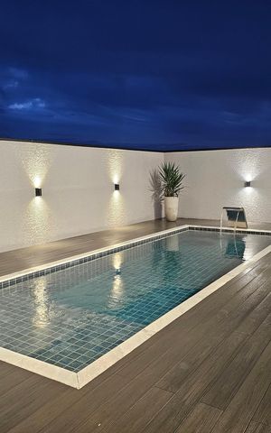 Casa de condomínio à venda com 330m², 4 quartos e 6 vagas Casa de condomínio à venda com 330m², 4 quartos e 6 vagasÁrea externa