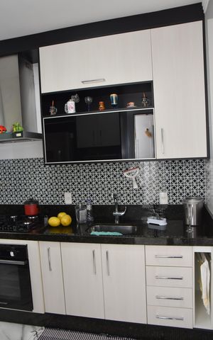 Casa de condomínio à venda com 87m², 3 quartos e 2 vagasCozinha pia