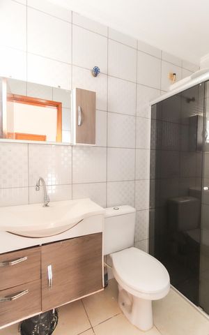 Casa de condomínio à venda com 72m², 2 quartos e 2 vagas Casa de condomínio à venda com 72m², 2 quartos e 2 vagasBanheiro da Suíte 1