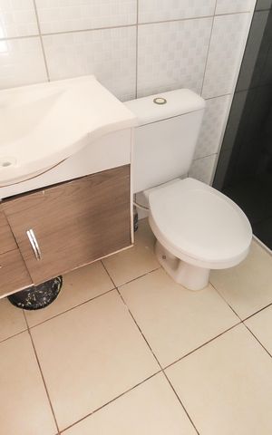 Casa de condomínio à venda com 72m², 2 quartos e 2 vagas Casa de condomínio à venda com 72m², 2 quartos e 2 vagasBanheiro da Suíte 1