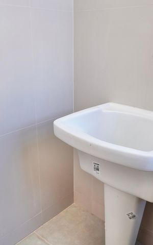 Casa à venda com 163m², 3 quartos e 2 vagas Casa à venda com 163m², 3 quartos e 2 vagasCozinha e Área de Serviço - Casa 1