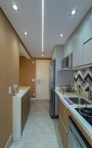 Apartamento à venda com 92m², 2 quartos e 2 vagasCozinha e Área de Serviço
