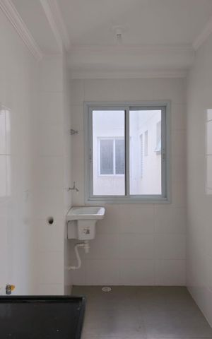 Apartamento à venda com 57m², 2 quartos e 1 vaga Apartamento à venda com 57m², 2 quartos e 1 vagaCozinha e Área de Serviço