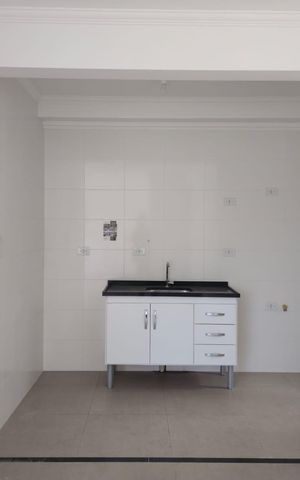 Apartamento à venda com 57m², 2 quartos e 1 vaga Apartamento à venda com 57m², 2 quartos e 1 vagaCozinha e Área de Serviço
