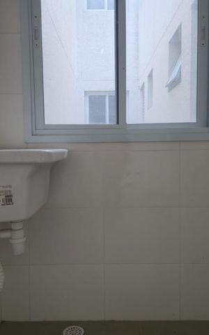 Apartamento à venda com 57m², 2 quartos e 1 vaga Apartamento à venda com 57m², 2 quartos e 1 vagaCozinha e Área de Serviço