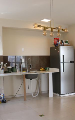 Apartamento à venda com 55m², 2 quartos e 1 vagaCozinha e Área de Serviço