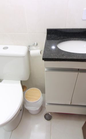 Casa de condomínio à venda com 68m², 2 quartos e 1 vagaBanheiro da Suíte 2