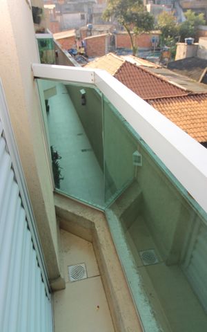 Casa de condomínio à venda com 68m², 2 quartos e 1 vagaVaranda suiíte 1