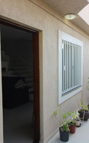 Casa de condomínio à venda com 68m², 2 quartos e 1 vagafachada da casa