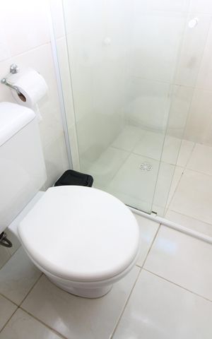 Casa de condomínio à venda com 68m², 2 quartos e 1 vagaBanheiro da Suíte 1