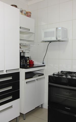 Casa de condomínio à venda com 68m², 2 quartos e 1 vagaCozinha