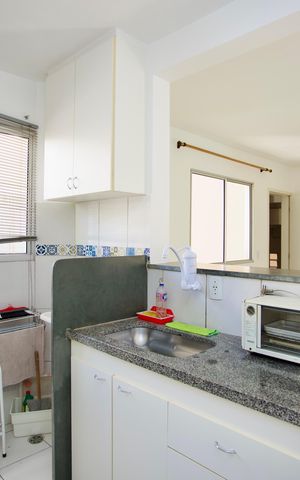 Apartamento à venda com 55m², 2 quartos e 1 vaga Apartamento à venda com 55m², 2 quartos e 1 vagaCozinha e Área de Serviço