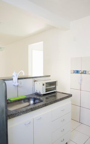 Apartamento à venda com 55m², 2 quartos e 1 vaga Apartamento à venda com 55m², 2 quartos e 1 vagaCozinha e Área de Serviço