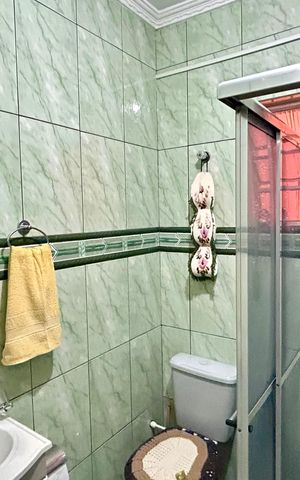 Casa à venda com 133m², 2 quartos e 2 vagas Casa à venda com 133m², 2 quartos e 2 vagasBanheiro 1