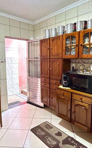Casa à venda com 133m², 2 quartos e 2 vagas Casa à venda com 133m², 2 quartos e 2 vagasCozinha