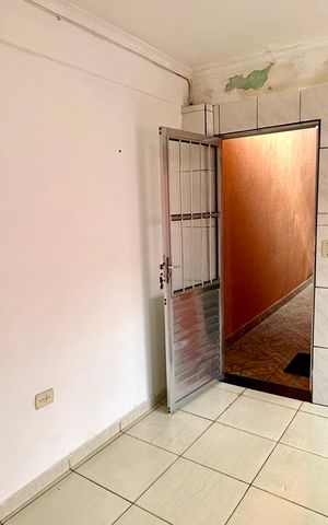 Casa à venda com 133m², 2 quartos e 2 vagas Casa à venda com 133m², 2 quartos e 2 vagasCozinha