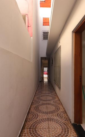 Casa à venda com 177m², 3 quartos e 2 vagasCorredor externo