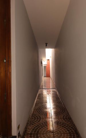 Casa à venda com 177m², 3 quartos e 2 vagasCorredor externo
