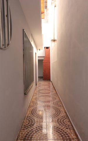 Casa à venda com 177m², 3 quartos e 2 vagasCorredor externo