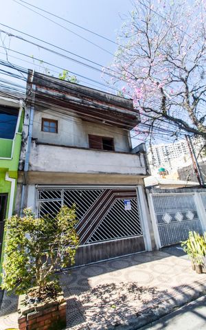 Casa à venda com 125m², 4 quartos e 2 vagas Casa à venda com 125m², 4 quartos e 2 vagasVista da Rua