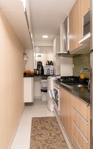 Apartamento à venda com 120m², 2 quartos e 2 vagas Apartamento à venda com 120m², 2 quartos e 2 vagasCozinha e Área de Serviço