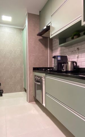 Apartamento à venda com 101m², 3 quartos e 2 vagas Apartamento à venda com 101m², 3 quartos e 2 vagasCozinha e Área de Serviço