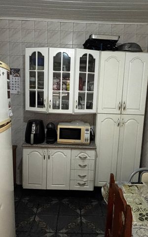 Casa à venda com 100m², 3 quartos e 1 vaga Casa à venda com 100m², 3 quartos e 1 vagaCozinha