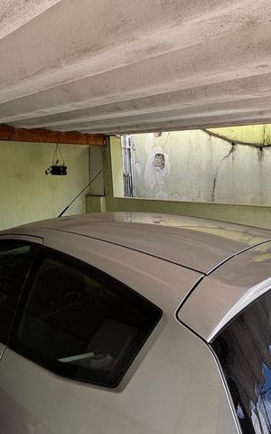 Casa à venda com 100m², 3 quartos e 1 vaga Casa à venda com 100m², 3 quartos e 1 vagaGaragem