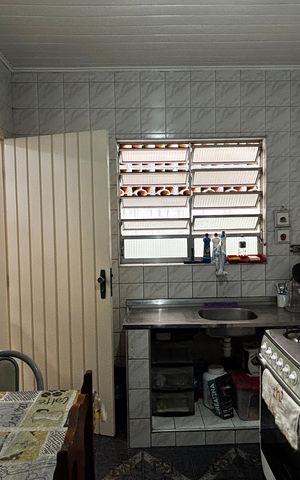 Casa à venda com 100m², 3 quartos e 1 vaga Casa à venda com 100m², 3 quartos e 1 vagaCozinha