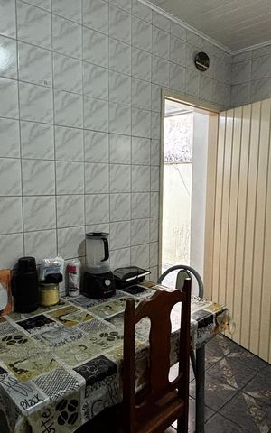 Casa à venda com 100m², 3 quartos e 1 vaga Casa à venda com 100m², 3 quartos e 1 vagaCozinha