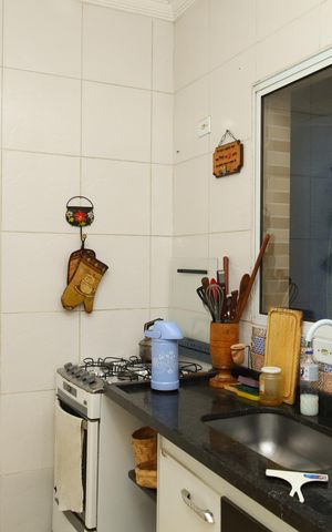 Casa de condomínio à venda com 62m², 2 quartos e 1 vagaCozinha
