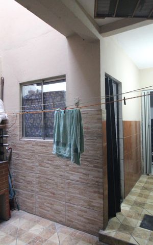 Casa à venda com 110m², 3 quartos e 1 vagaFundos da casa / churrasqueira