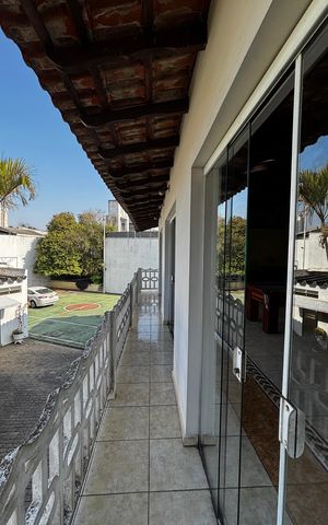 Casa para alugar com 580m², 4 quartos e 30 vagas Casa para alugar com 580m², 4 quartos e 30 vagasVaranda da área comum