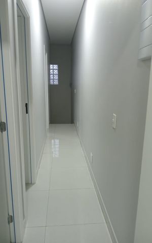 Casa à venda com 125m², 6 quartos e 2 vagas Casa à venda com 125m², 6 quartos e 2 vagasCorredor