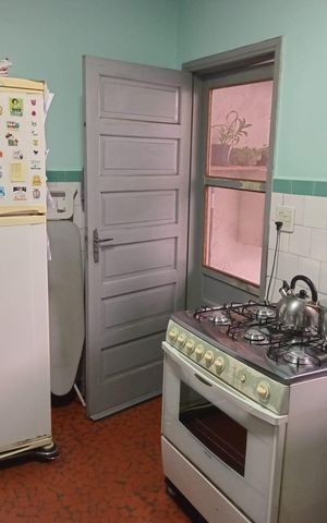 Casa à venda com 125m², 6 quartos e 2 vagas Casa à venda com 125m², 6 quartos e 2 vagasCozinha