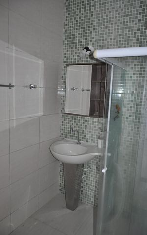 Casa de condomínio à venda com 62m², 2 quartos e 2 vagasBanheiro social
