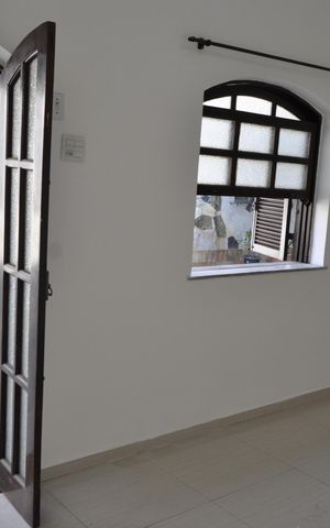 Casa de condomínio à venda com 62m², 2 quartos e 2 vagasSala