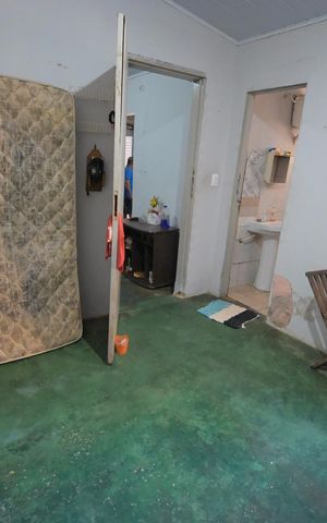 Casa à venda com 54m², 5 quartos e 1 vaga