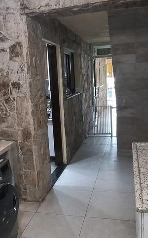 Casa à venda com 106m², 3 quartos e 2 vagas Casa à venda com 106m², 3 quartos e 2 vagasCozinha