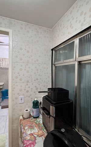 Casa à venda com 29m², 2 quartos e sem vaga Casa à venda com 29m², 2 quartos e sem vagaCozinha e Área de Serviço