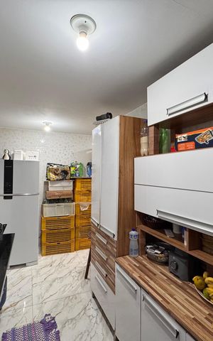 Casa à venda com 29m², 2 quartos e sem vaga Casa à venda com 29m², 2 quartos e sem vagaCozinha e Área de Serviço
