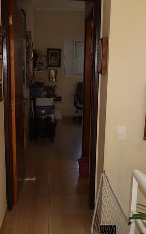 Casa à venda com 85m², 2 quartos e 2 vagasCorredor