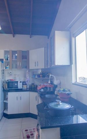Casa à venda com 115m², 4 quartos e 2 vagas Casa à venda com 115m², 4 quartos e 2 vagasCozinha