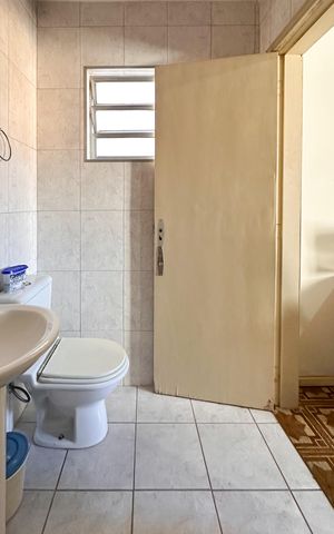 Casa à venda com 180m², 3 quartos e 2 vagas Casa à venda com 180m², 3 quartos e 2 vagasBanheiro da Suíte 1