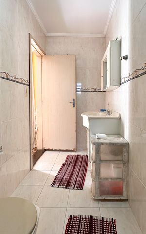 Casa à venda com 180m², 3 quartos e 2 vagas Casa à venda com 180m², 3 quartos e 2 vagasBanheiro da Suíte 2