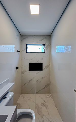 Casa à venda com 100m², 3 quartos e 2 vagasBanheiro da Suíte 1