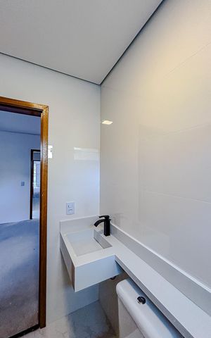Casa à venda com 100m², 3 quartos e 2 vagasBanheiro da Suíte 1