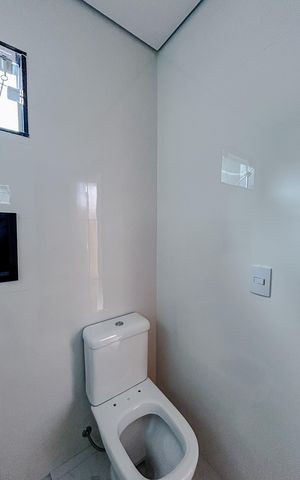 Casa à venda com 100m², 3 quartos e 2 vagasBanheiro da Suíte 3