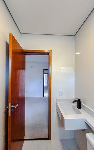 Casa à venda com 100m², 3 quartos e 2 vagasBanheiro da Suíte 1