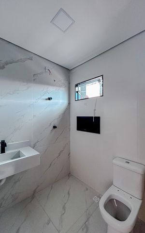 Casa à venda com 100m², 3 quartos e 2 vagasBanheiro da Suíte 3